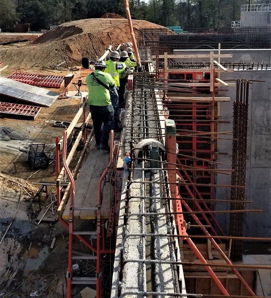 Crews pouring the wall