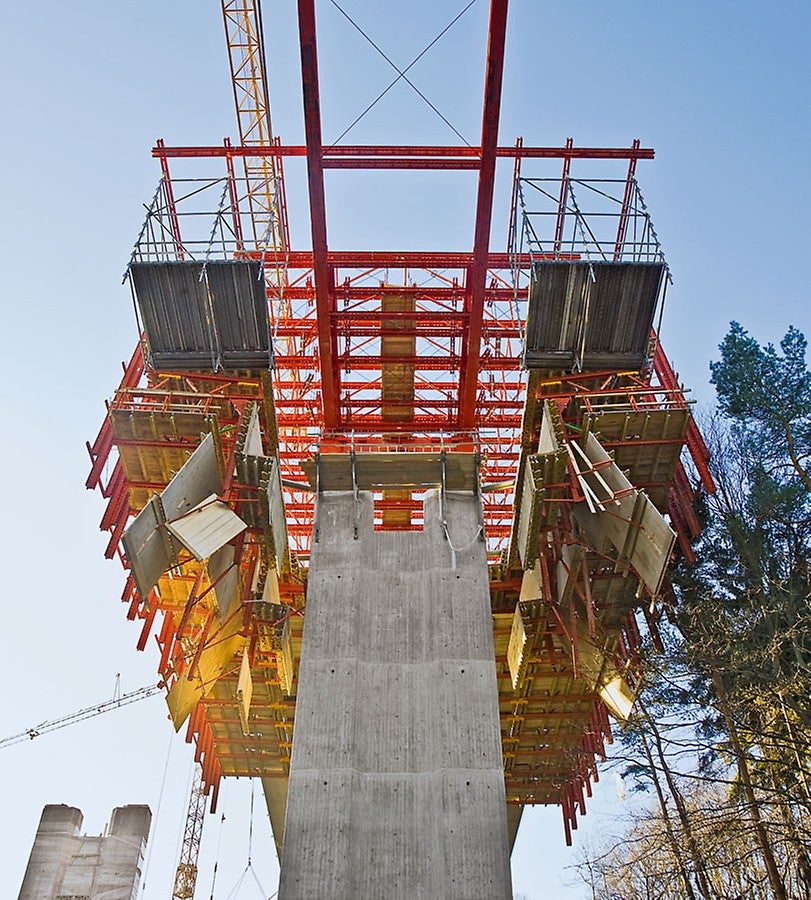 For moving past the bride piers, the slab formwork is simply folded downwards hydraulically.