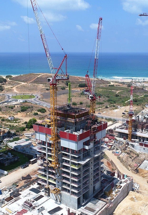 תכנון הנדסי המאפשר ניתוק הגרעין המרכזי מתקרות בהיקף ויציקת הגרעין 3-4 קומות מעל מפלס התקרה וחמשת הממ"דים