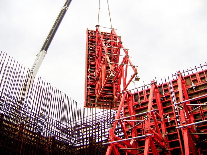 Lifting Trio SB into place.