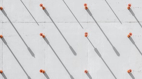 DK ties form a regular pattern across the concrete surface. <br/>(Photo: seanpollock.com)