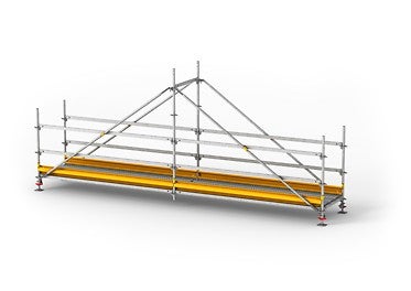 Die Grabenbrücke aus dem PERI UP Gerüstbaukasten sorgt für einen sicheren Zugang zur Baustelle.<br/>