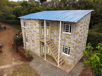 The blocks are produced locally, made by hand with our TwistBlock Mould, and assembled without mortar. 