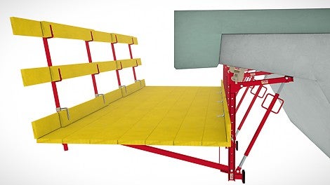 In the first stage of a refurbishment project, the working bracket serves as a platform for the removal of the existing cantilevered parapet.