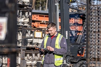 Through a large rental equipment park with numerous locations around the world