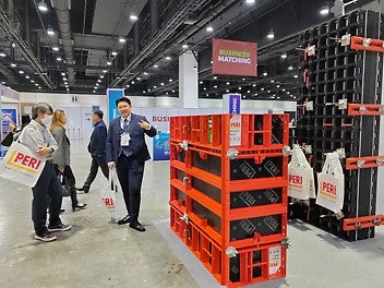Visitors engage with PERI experts at the booth, exploring cutting-edge formwork and scaffolding solutions.