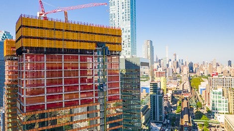 Wrapped in glass with bands of terra-cotta between each floor give the towers a unique and aesthetic appearance