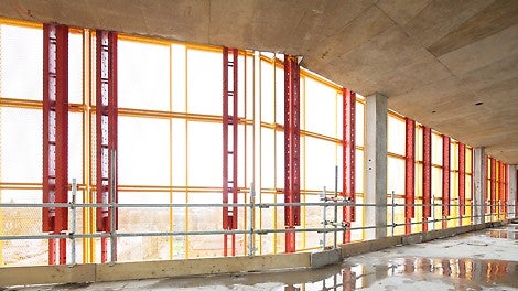 View of the LPS screens in place from the inside of the building, demonstrating the mesh panel allowing excellent daylight into the building