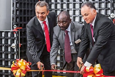 The launch event of the PERI subsidiary in Tanzania (f.l.t.r.): Theunis Visser, PERI Business Development South Africa; Johan Issack M. Peter, Director of Innovation, National Housing Corporation Tanzania; and Giuseppe Rosiello, Managing Director PERI Tanzania.