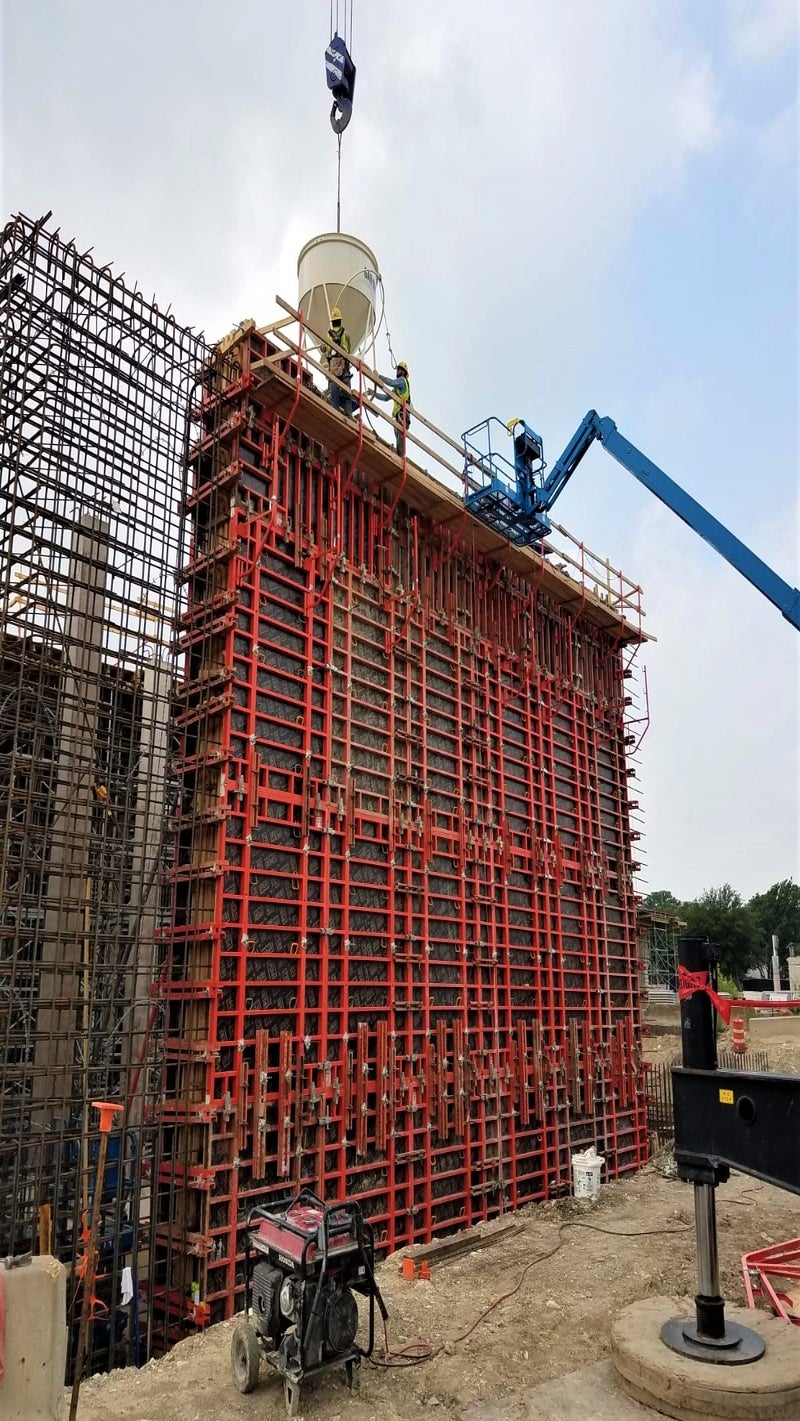 TRIO was used to for the 32 foot tall walls. Panels were ganged on the ground and flown into place at full height