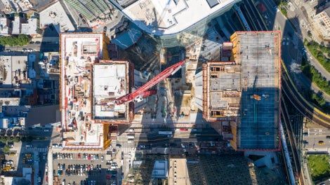 The two towers are connected by a 1 acre park on top of the 5-level tall podium. Having the cores on the sides of the towers, allows for unobstructed side-to-side views on the inside of the office floors.