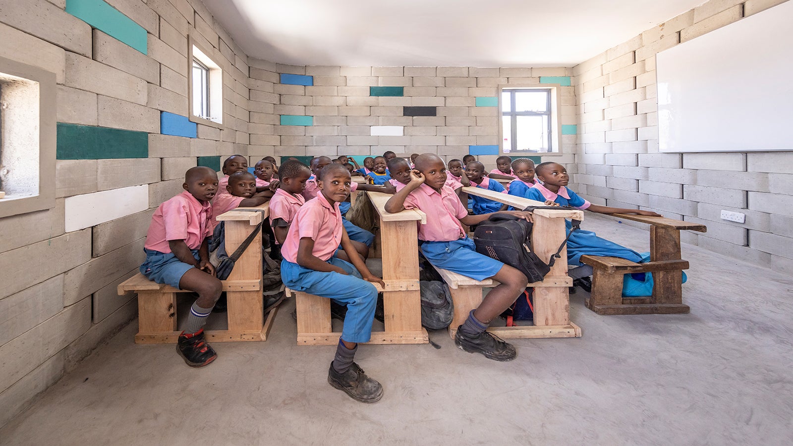 Together with our employees, we support education, communities, and the environment.