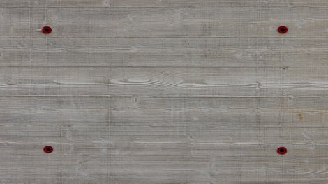 Board finish concrete pattern with symmetrical tie holes for exposed architectural concrete finish in building construction 