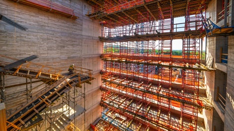 PD5 shoring system provided support for slab formwork due to its high load-bearing capacity of 10,000 lbs per leg. 