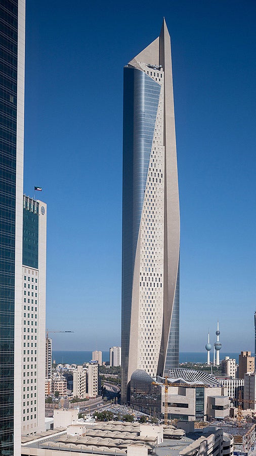 The Al Hamra Tower is situated on the eastern lifeline of Kuwait City, near the characteristic water towers.