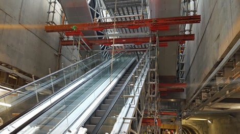 Udveksling over de to midterste rulletrapper