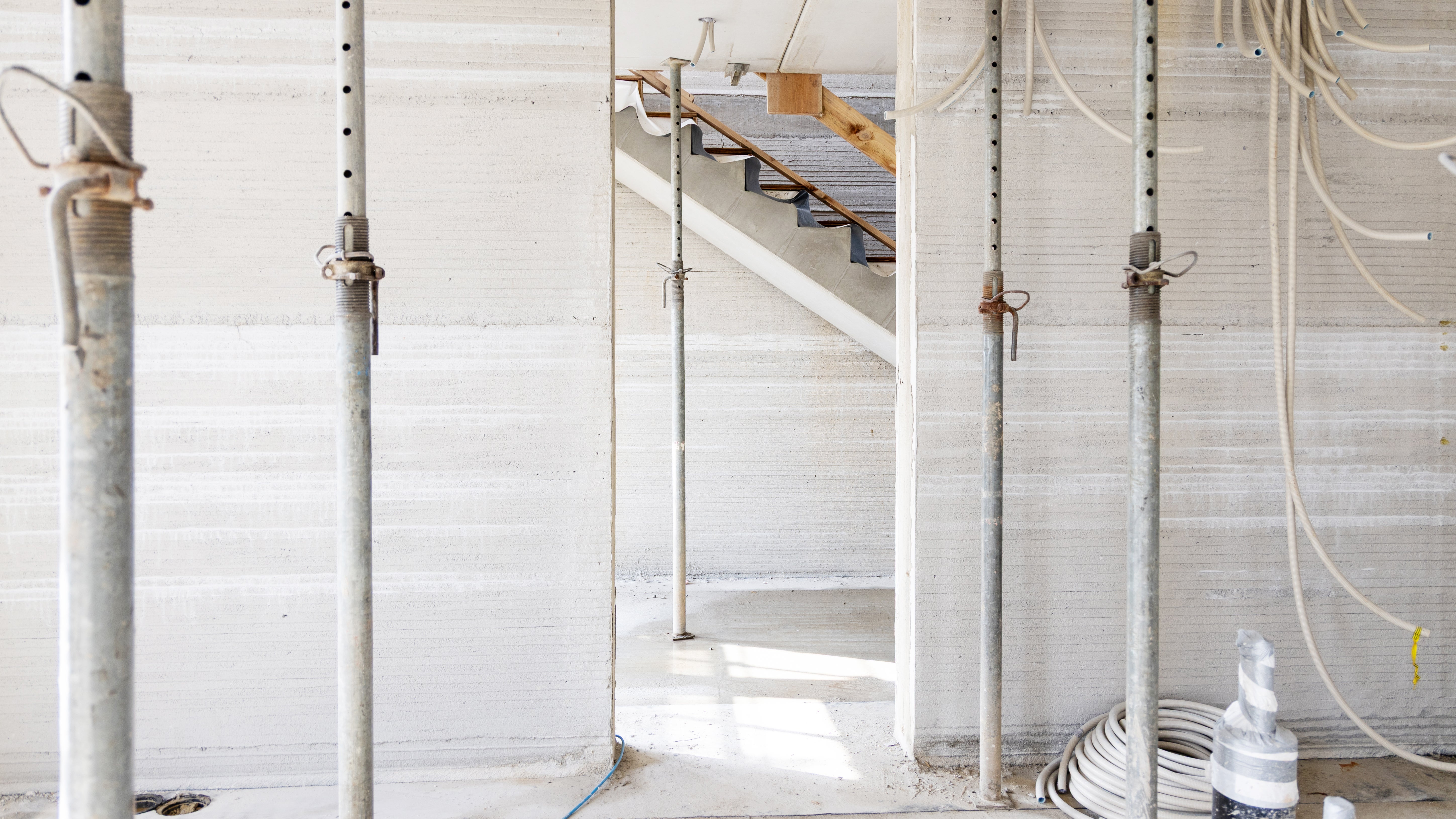 During the construction of the third house, evoZero® from Heidelberg Materials was used for the first time in Germany as a binding agent – the world’s first net-zero cement based on carbon capture and storage.<br/>(Photo: PERI 3D Construction)