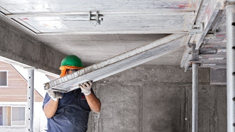 使用下落式柱头，实现楼板模板的早拆。