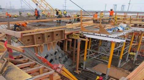 The interior soffit formwork is being formed by SKYDECK.